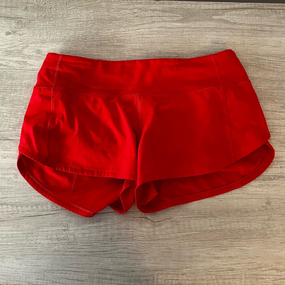 Lululemon speed up low rise 2.5 in shorts color is alarming red. No drawstring